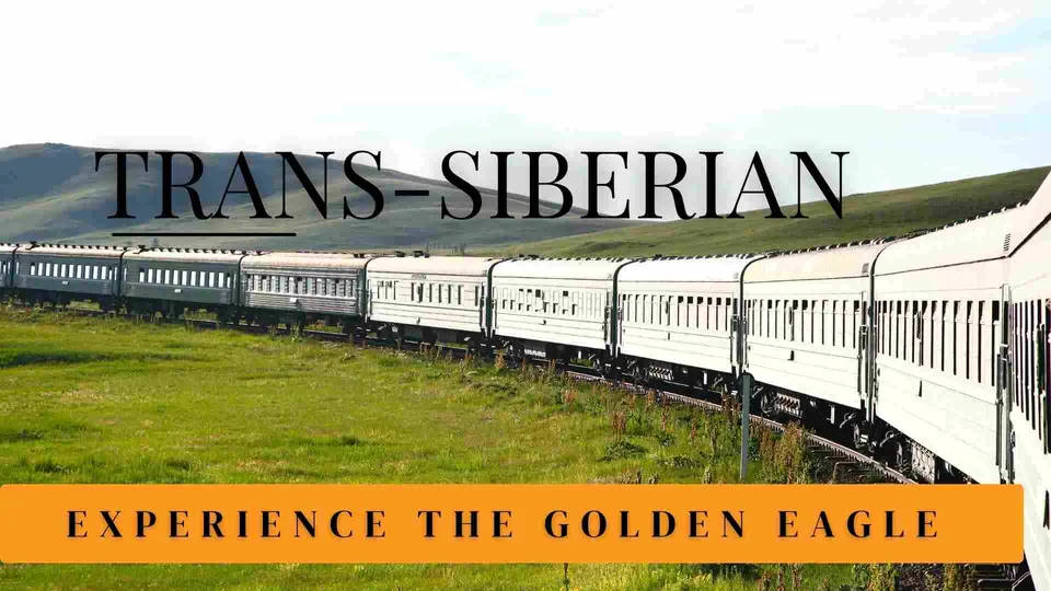 รถไฟสีขาวหลายตู้วิ่งบนรางผ่านทุ่งหญ้าเขียวขจี มีข้อความ "TRANS-SIBERIAN" และ "EXPERIENCE THE GOLDEN EAGLE" ปรากฏบนภาพ